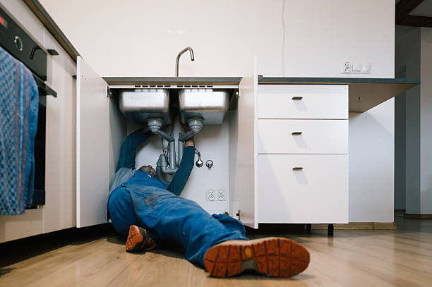 Professional Emergency Plumber technician working in Fort Smith, MT